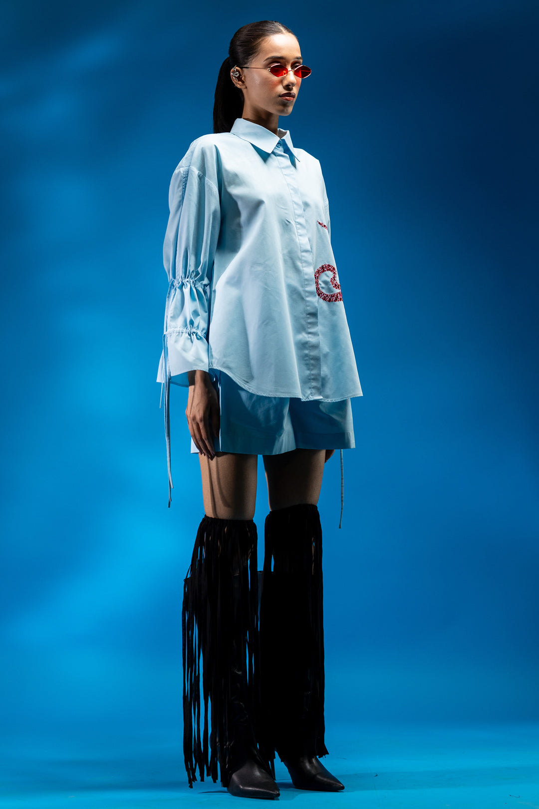 Sky blue shirt with octopus tentacle embroidery