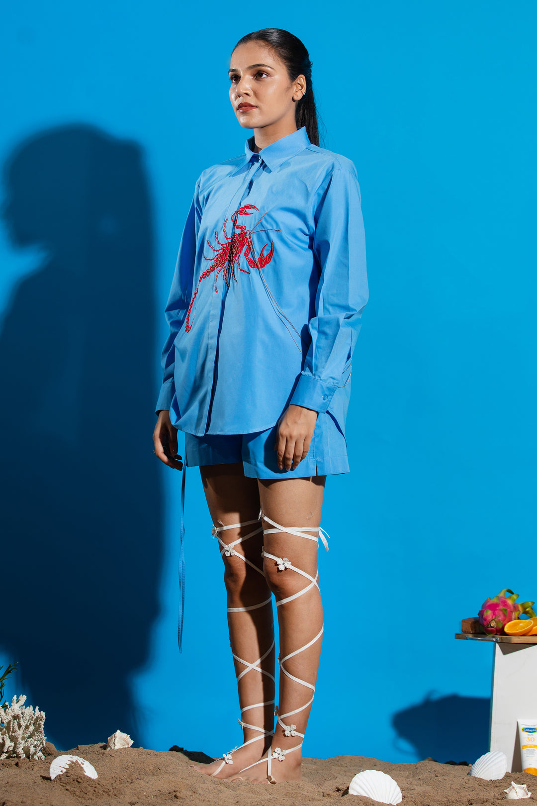 Blue shirt with red scorpion embroidery
