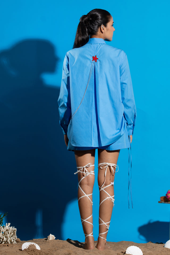 Blue shirt with red scorpion embroidery