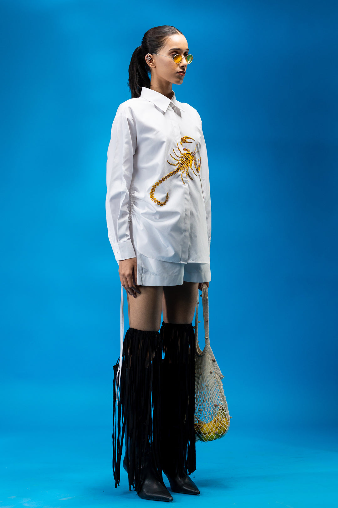 White shirt with red scorpion embroidery