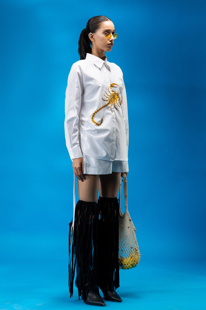 White shirt with red scorpion embroidery