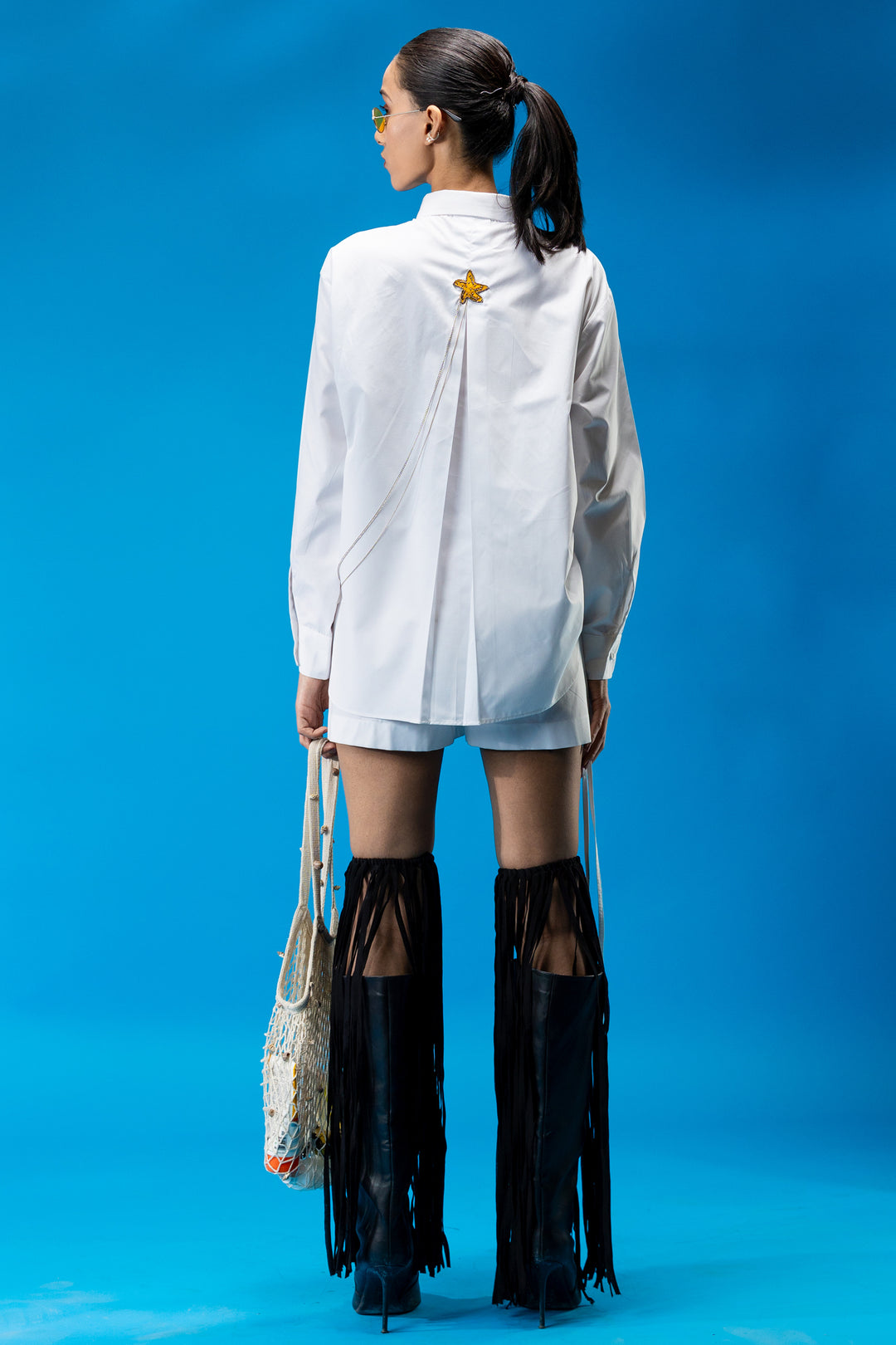 White shirt with red scorpion embroidery