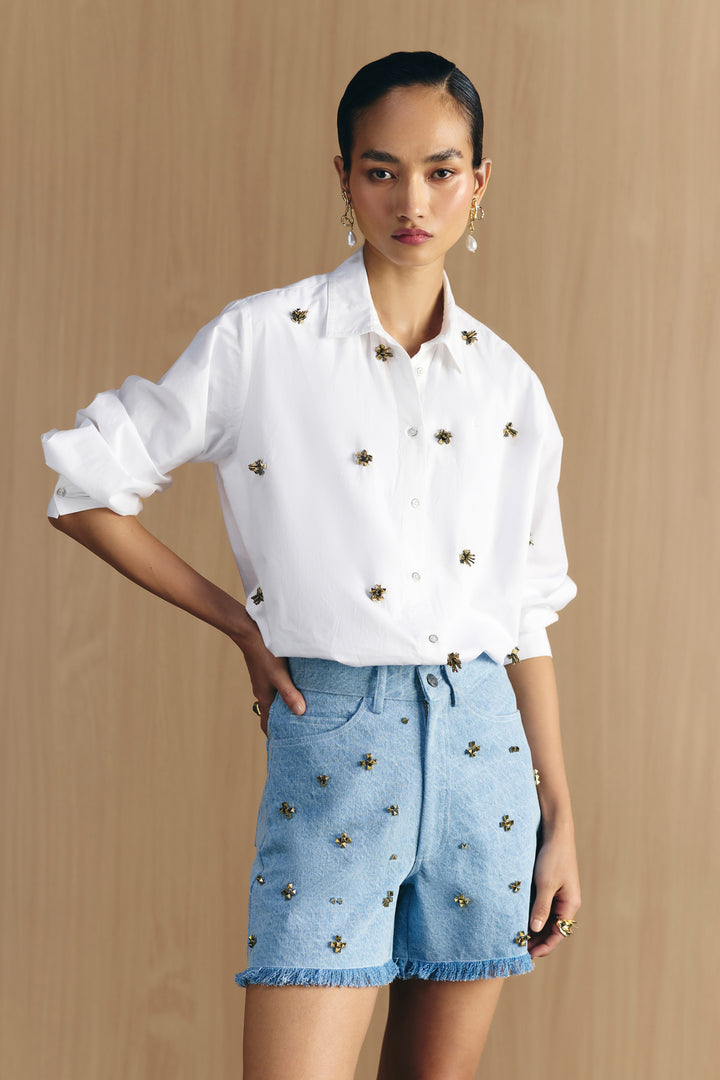 WASHED DENIM STUDDED SHORTS