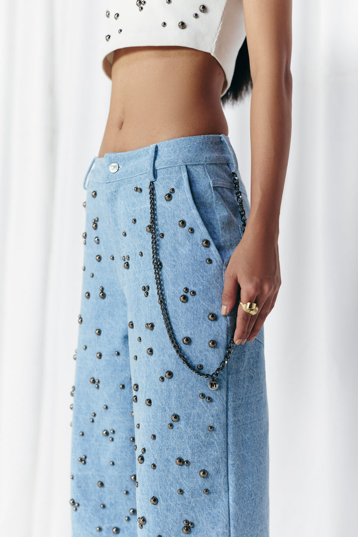 WASHED DENIM STUDDED JEANS